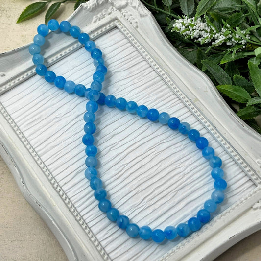 8mm Light Blue Marbled Stretch Necklace